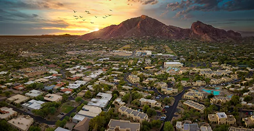 An aerial view of the city of Scottsdale, Arizona showcasing Paradise Valley and Biltmore.